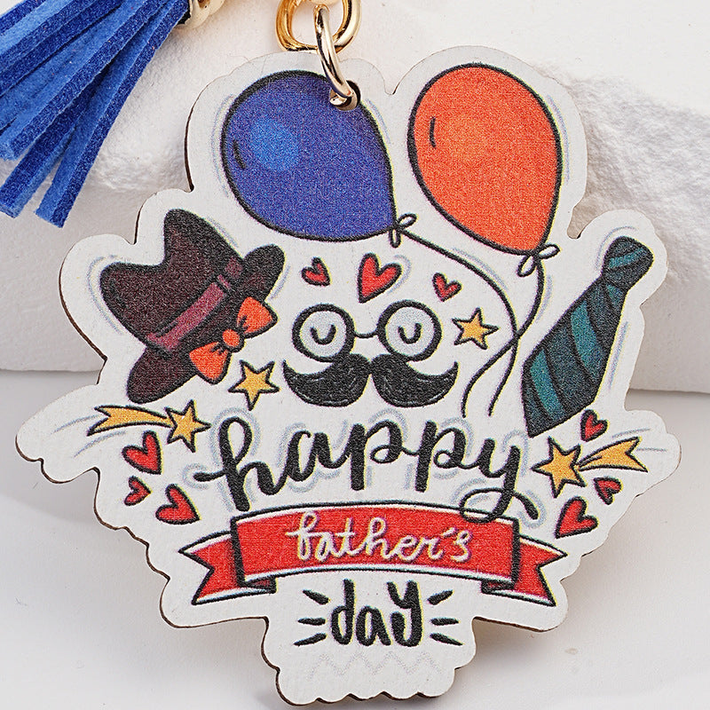 Impresión al por mayor de dibujos animados de metal Día del padre Tassel Keychain